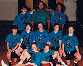 Jesse Rochelle with Basketball Team